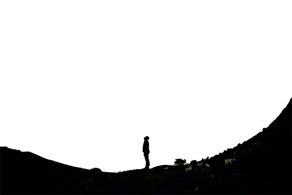 a boy looking up at a starry sky